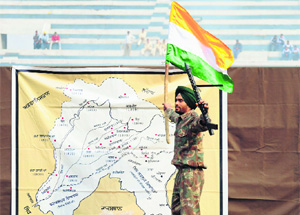 A student performs in a patriotic play during the opening ceremony of the Punjab State Rural Games for Boys (Under-16) at Guru Nanak Stadium in Ludhiana on Saturday.