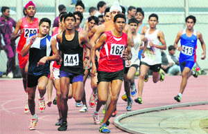 Boys take part in 800m race on the opening day of the Punjab Rural Games (Boys) at Guru Nanak Stadium in Ludhiana on Saturday.