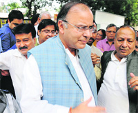 Ticket-seekers surround Arun Jaitley in New Delhi. 