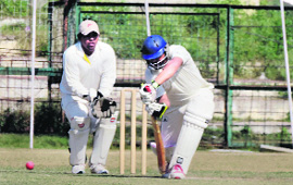 A cricket match in progress during the All-India Inter-Zonal Cricket Tournament at Gandhi Ground in Amritsar on Sunday.