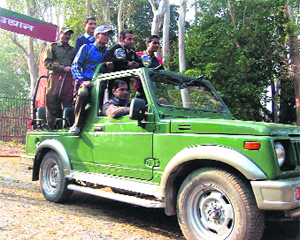 Officials inspect the wildlife safari at the Rajaji National Park, Chilla range, in Pauri Garhwal. 