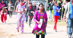 Students come out of Saraswati Vidya Mandir after appearing in a SSC recruitment examination in Haridwar on Sunday. 