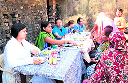 US doctors conduct free health check up of slum dwellers during a medical camp organised by the Parmarth Niketan Ashram in Rishikesh on Saturday
