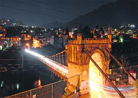 A night view of the Victoria Bridge in Mandi on Sunday. It was constructed in 1877 by Raja Vijay Sen