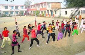 Girls of Government Senior Secondary School, Mahadev, take self-defence training at a karate training camp at Mahadev village in Sundernagar on Sunday