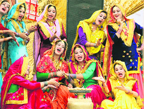 Bonhomie: Girls participate in a giddha competition at Virasat Yuvak Mela at Lyallpur Khalsa College, Jalandhar, on Sunday.