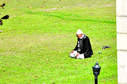 An elderly offer namaz at a park in Jammu on Sunday