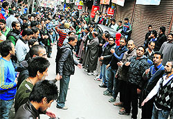 Shia Muslims gather during a religious procession in Srinagar on Sunday
