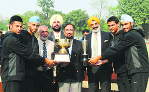 BS Sidhu, DGP, Uttarakhand (centre), an alumnus of the school, and PPS Headmaster Jagpreet Singh alongwith the winning team members of the IPSC (U-19) Athletics Championship