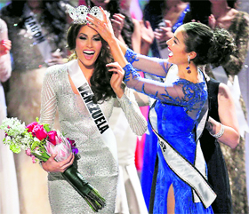 Miss Universe 2012 Olivia Culpo, from the United States, right, places the crown on Miss Venezuela Gabriela Isler during the 2013 Miss Universe pageant in Moscow on Saturday.