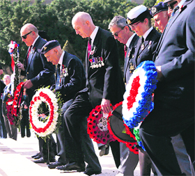 War veterans lay wreaths on the occasion of Rememberance Day, at the War Memorial in Valleta on Sunday.