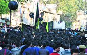 Muslims participate in a Muharram procession in Jammu on Monday.