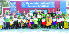 Participants of a fancy dress competition at Ryan International School in Amritsar on Tuesday.