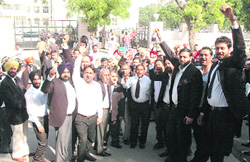 Lawyer staging a protest outside the office of the SSP in Bathinda on Tuesday. 