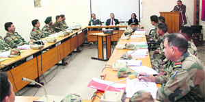 Officials of eco-task force battalions attend a training workshop at the Forest Research Institute in Dehradun on Monday. 