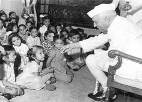 Jawaharlal Nehru interacting with children