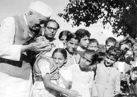 Jawaharlal Nehru interacting with children