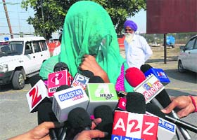 The rape victim speaks to mediapersons at Sirsa on Tuesday