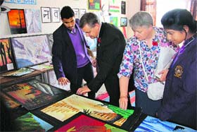 Andrew Hines watches presentations by students of Him Academy Public School in Hamirpur on Tuesday