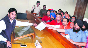 Members of the Shaheed-e-Azam Bhagat Singh Naujawan Sabha present a memorandum against film Ram Leela to the Deputy Commissioner in Jalandhar on Tuesday. 
