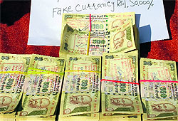 The fake currency notes worth Rs 1.5 lakh at the Tral police station on Tuesday