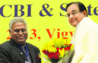 Finance Minister P Chidambaram with CBI Director Ranjit Sinha in New Delhi. Tribune photo: Mukesh Aggarwal 