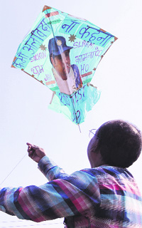 Kite maker Jagmohan Kanojia flies a kite, dedicated to Sachin Tendulkar, with the message Kabhi alvida na kehna' in Hindi painted on it in Amritsar on Wednesday.
