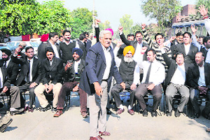 Members of the District Bar Association stage a protest against the implementation of Rent Control Act in Amritsar on Wednesday. 