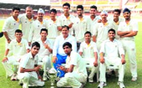 The Punjab players strike a pose with the trophy in Ahmedabad on Wednesday