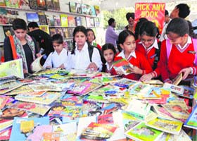 Students browse through books at the Chandigarh Book Fair, Parade Ground, Sector 17 in Chandigarh