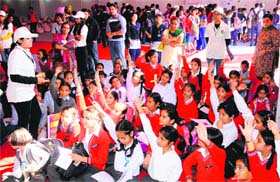Children participate in the Spell Bee contest during Chandigarh Book Fair on Wednesday