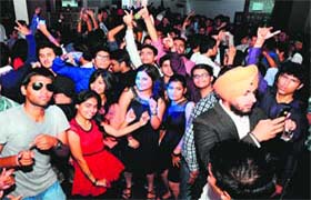 United colours of fun: Students of the University Institute of Engineering and Technology have a gala time during the freshers’ party at a discotheque in Sector 26, Chandigarh, on Wednesday