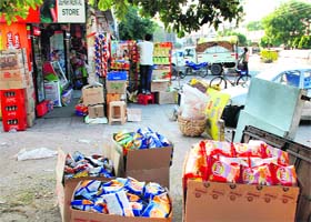 Traders use open space around the shops to display as well as stock their items at the Sector 9 market in Panchkula