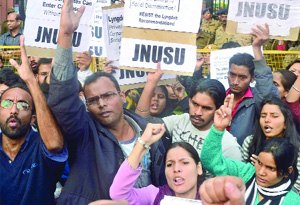 JNU students shout slogans during a demonstration outside the Supreme Court, demanding a review of the Lyndoh Committee recommendations by a constitutional bench and restoration of the university constitution in New Delhi on Wednesday.