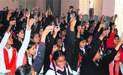 Students participate in a science awareness programme in Dehradun on Wednesday. 