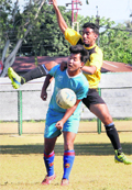 Players in action during the district football super league in Dehradun on Wednesday. Tribune photo: Vinod Pundir
