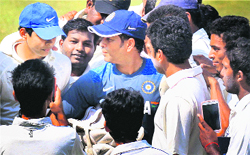 Sachin Tendulkar with his fans at Wankhede Stadium in Mumbai on Wednesday.  PTI