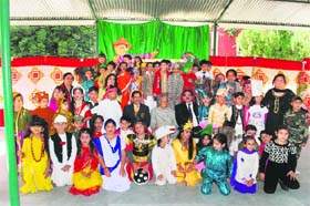 Students and teachers after the fancy dress competition during the annual sports day of MHAC School, Nagbani, in Jammu on Wednesday