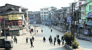 Paramilitary personnel deployed in Srinagar to enforce restrictions on the eighth day of Muharram in Srinagar on Wednesday