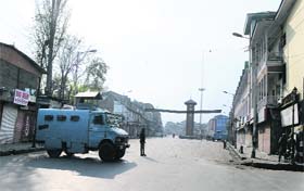 Paramilitary soldiers deployed at Lal Chowk to stop the movement of Muharram processions in Srinagar on Wednesday