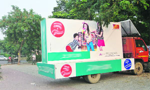 An illegal mobile advertising van stationed near Rajguru Nagar in Ludhiana. 