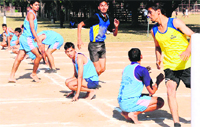 Players in action during the final of the Inter-College Kho-Kho Tournament at Panjab University in Chandigarh on Thursday. Tribune photo: Parvesh Chauhan