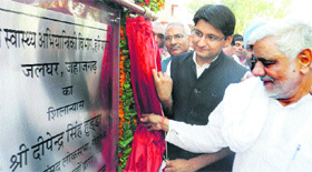 Deepender Hooda lays stone of water works at Jahajgarh village in Jhajjar.
