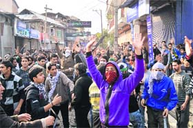 Shia Muslims take part in a procession in Srinagar on Thursday