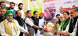 Congress workers pay floral tributes to Pt Jawaharlal Nehru on his birth anniversary in Ludhiana on Thursday