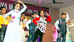 Students of Sanatan Vidya Mandir Senior Secondary School present a dance on the occasion of Children's Day in Ludhiana