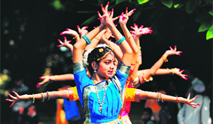 Schoolgirls participate in a traditional dance to commemorate 124th birth anniversary of Late Prime Minister Pt Jawaharlal Nehru in Allahabad on Thursday. 