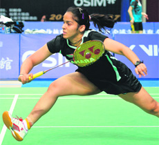 Saina Nehwal hits a return to Sun Yu of China in the second round at the China Open in Shanghai on Thursday. Sun won the match 16-21, 21-15, 21-17. 