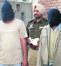 The arrested accused under the custody of the CIA staff in Amritsar on Friday. 