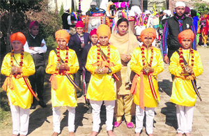 Children take part in a nagar kirtan to mark Gurpurb in Amritsar on Friday.